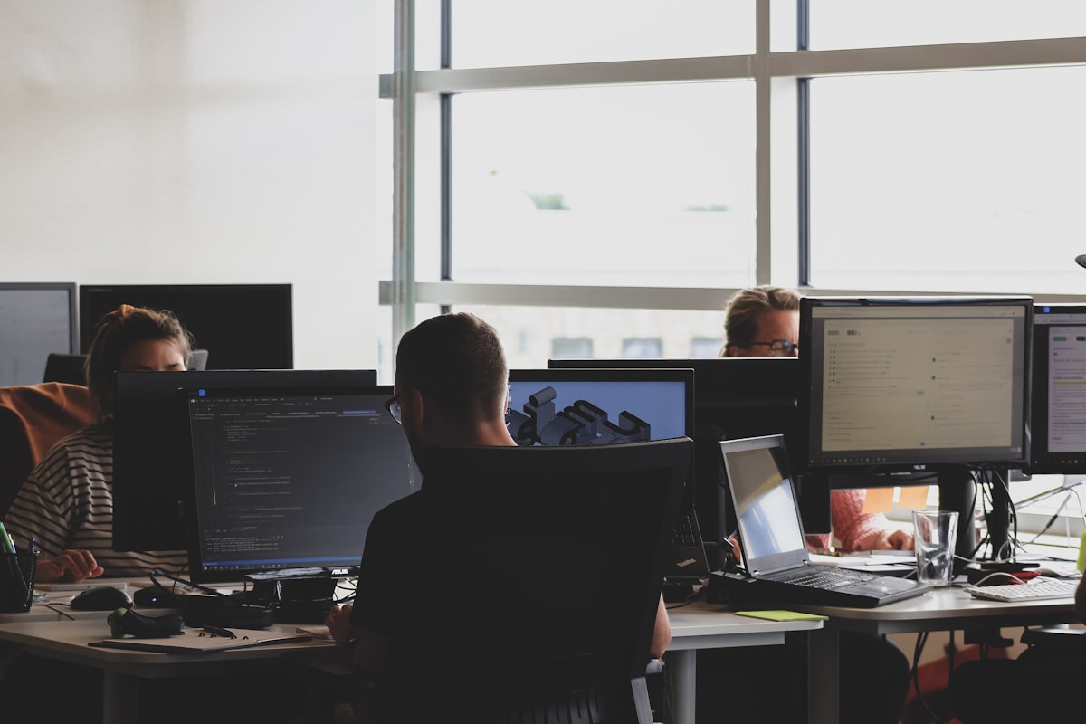 A software team working at screens
